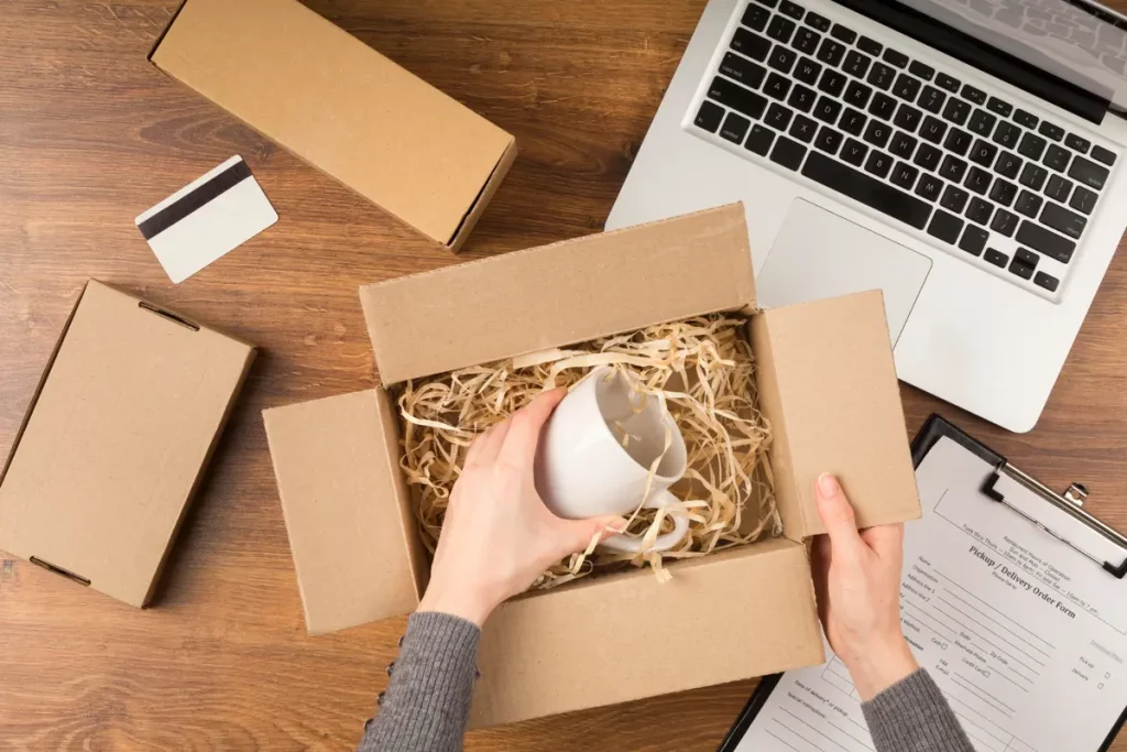 Top view woman preparing a cyber monday package