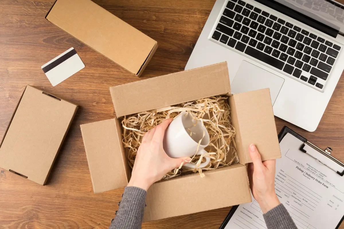 Top view woman preparing a cyber monday package