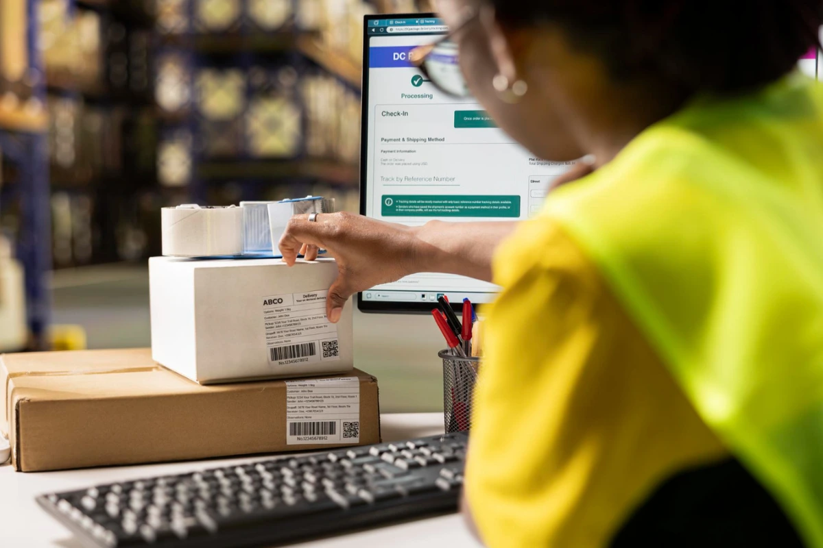 What Is Return Rate in eCommerce - African american female verifying the shipment details
