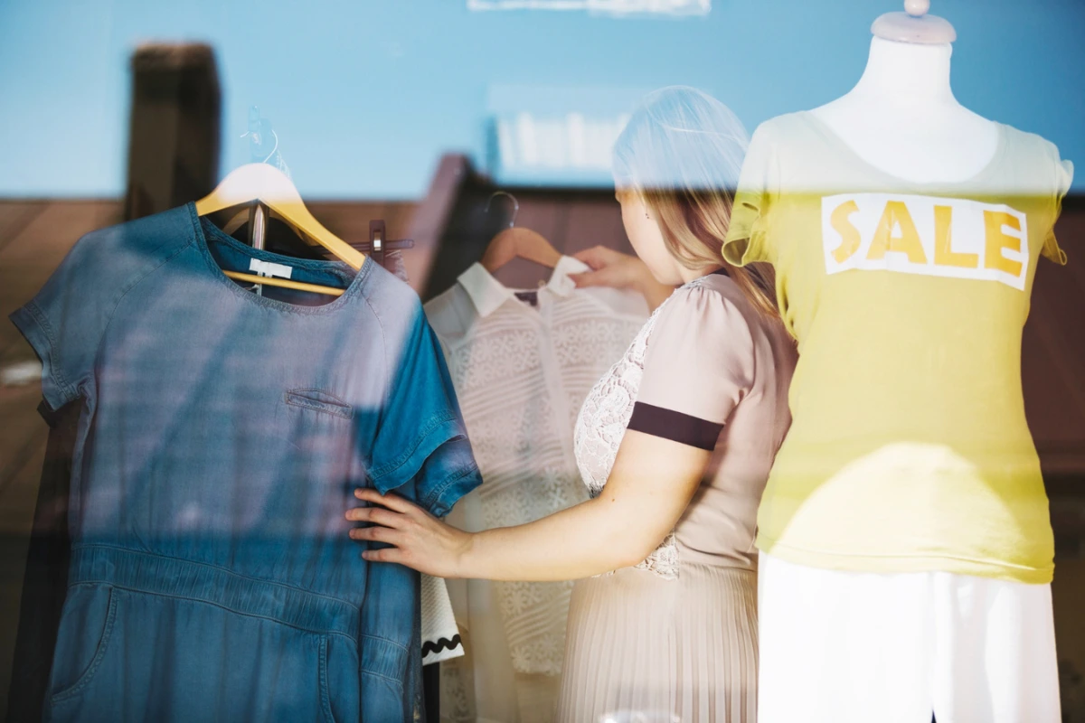 Why the Fashion Industry Has the Highest Return Rate - Woman choosing dress